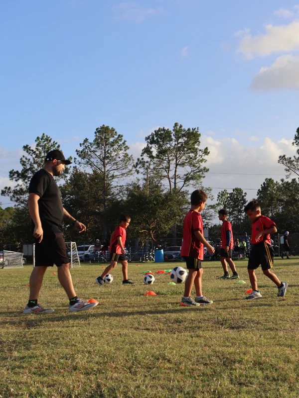 Child from Grit soccer club training 1